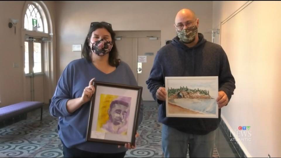 Ryan Annett and fellow artist at the 2022 disability arts collective gallery show, photographed by CTV News Atlantic.